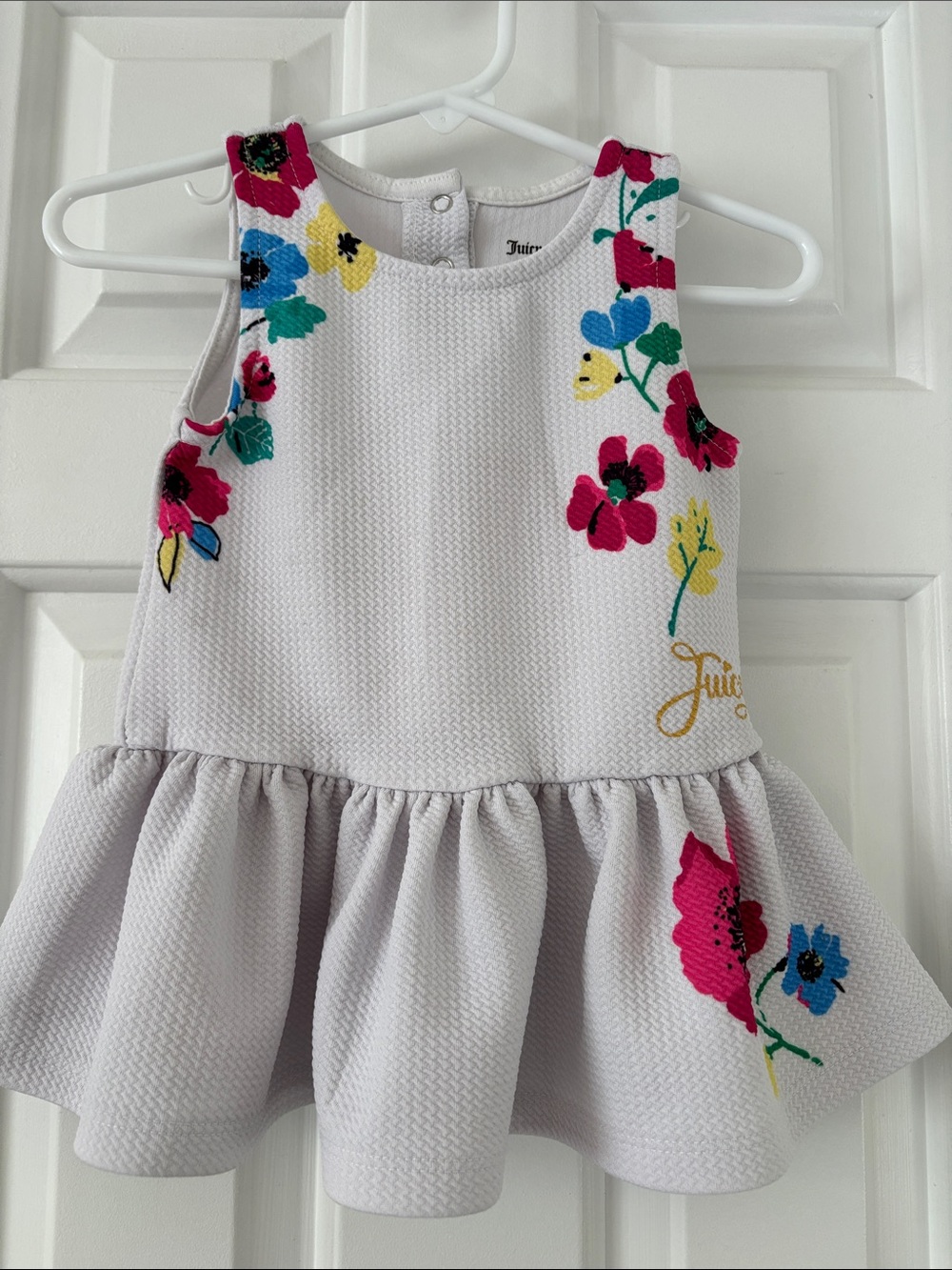 Juicy Couture White Peplum Top with Pink Blue Yellow Floral Embroidery